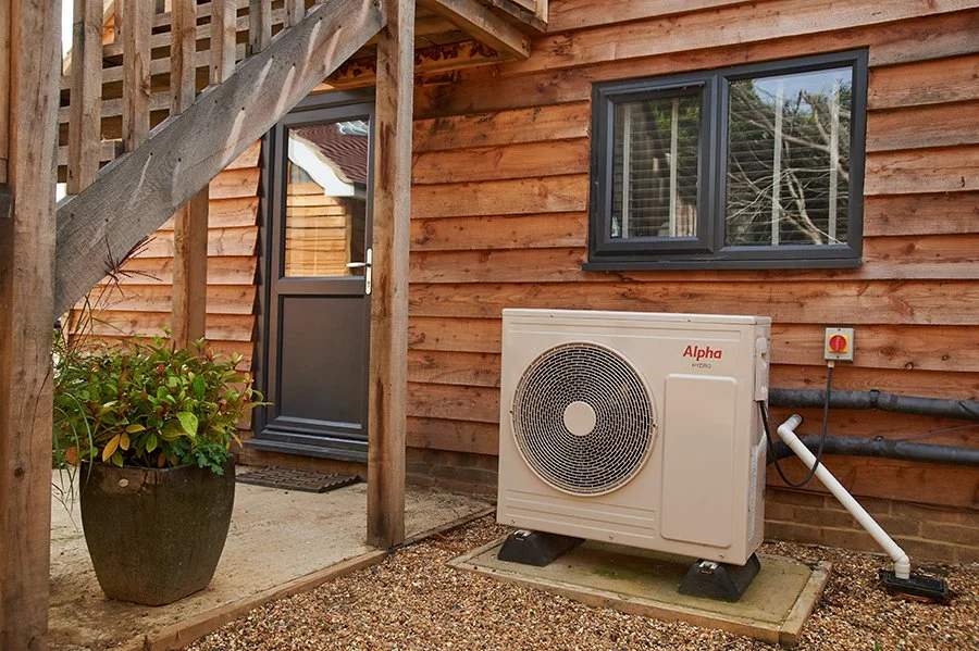 Air source heat pump installed outside a home